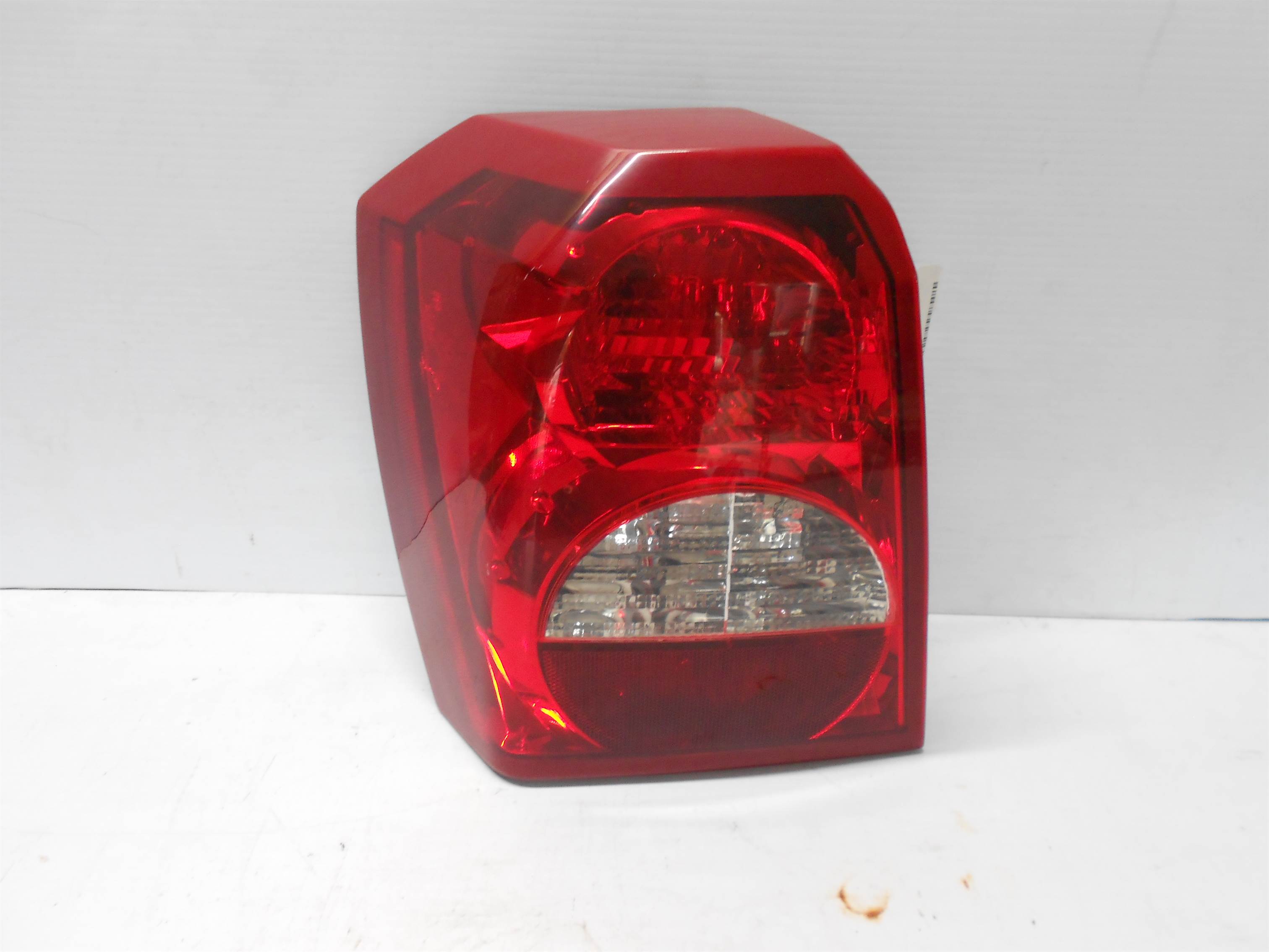 Used 2007 dodge caliber LH Left Driver side Tail lamp light fits for sale small view front thumbnail