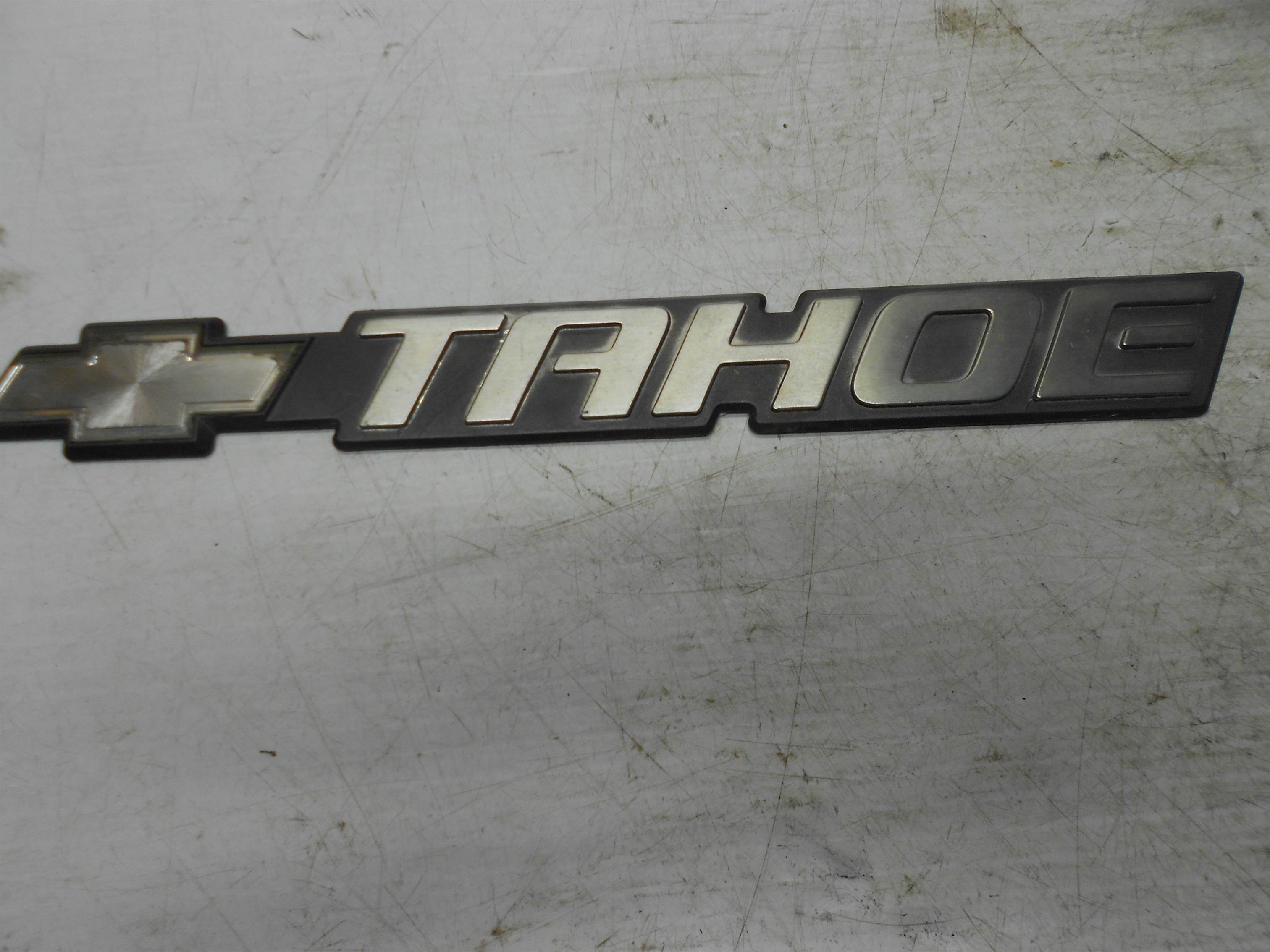 Used 00-06 CHEVROLET TAHOE SIDE REAR GATE EMBLEM BADGE SYMBOL LOGO OEM for sale small view front thumbnail