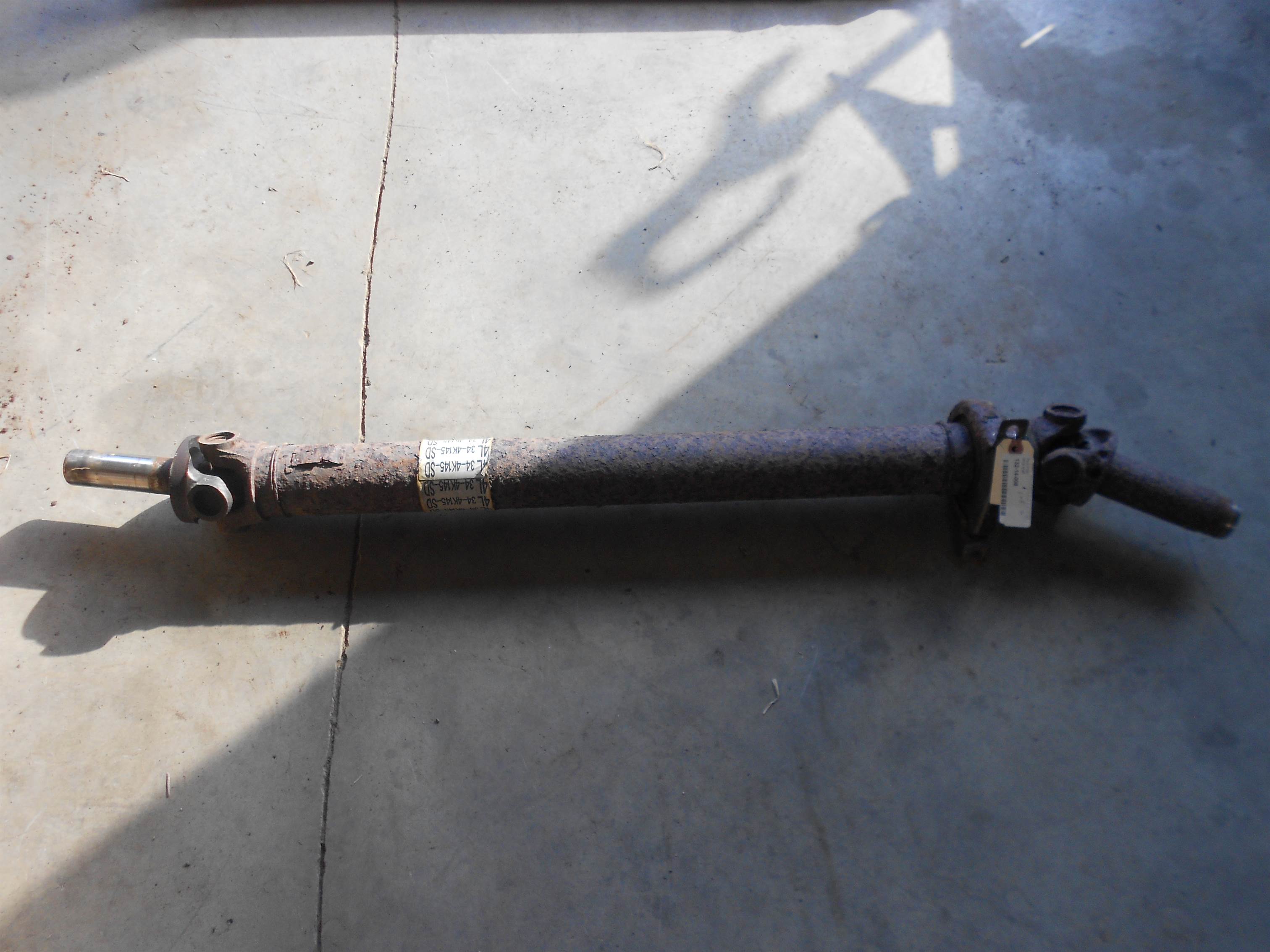 Used 2004 Ford F150 Driver Shaft 4.6L 4x2 carrier is bad for sale small view front thumbnail