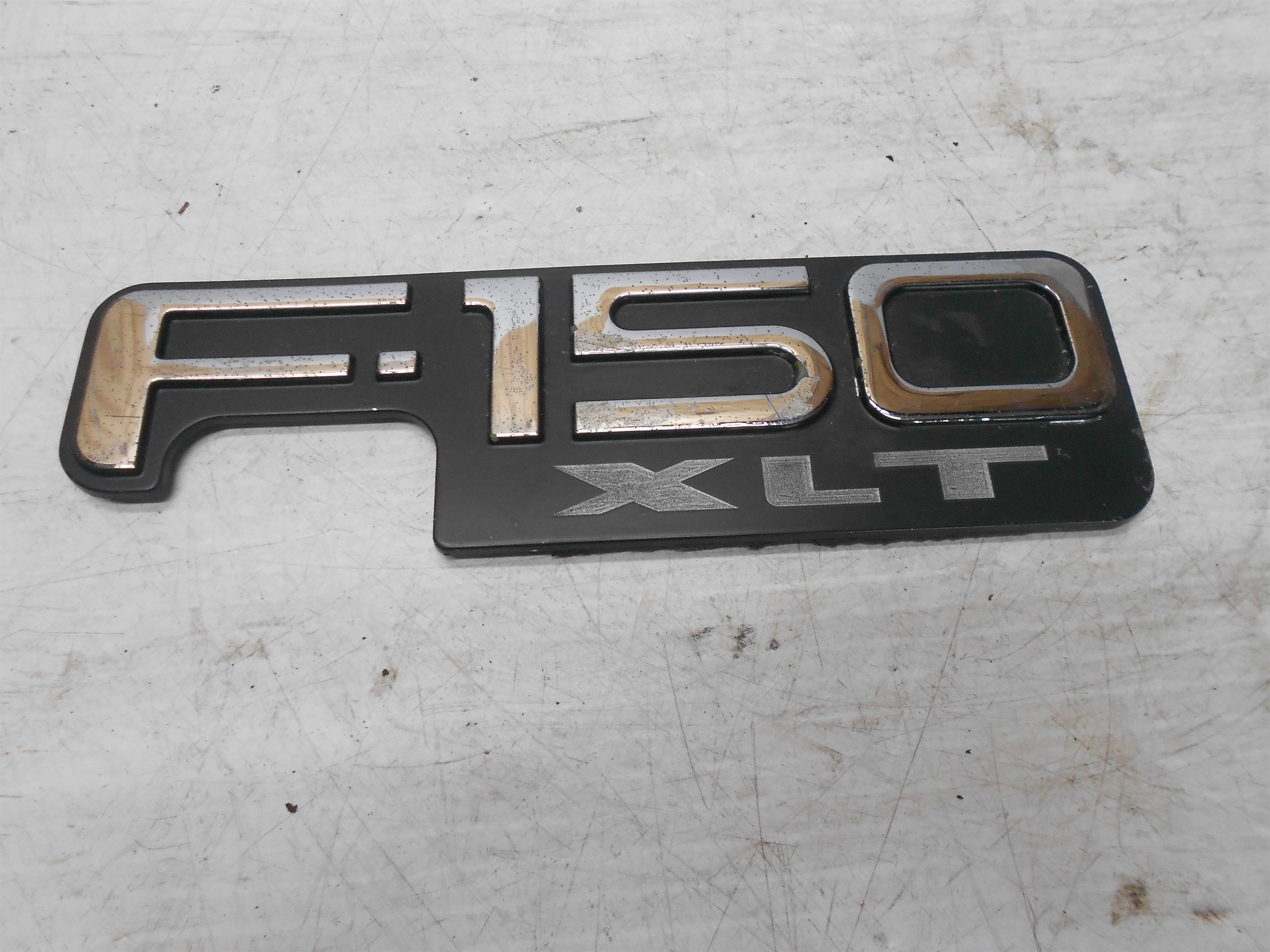 Used 97-03 FORD F-150 F150 FRONT FENDER EMBLEM BADGE NAMEPLATE F65B-16B114-CA for sale small view front thumbnail