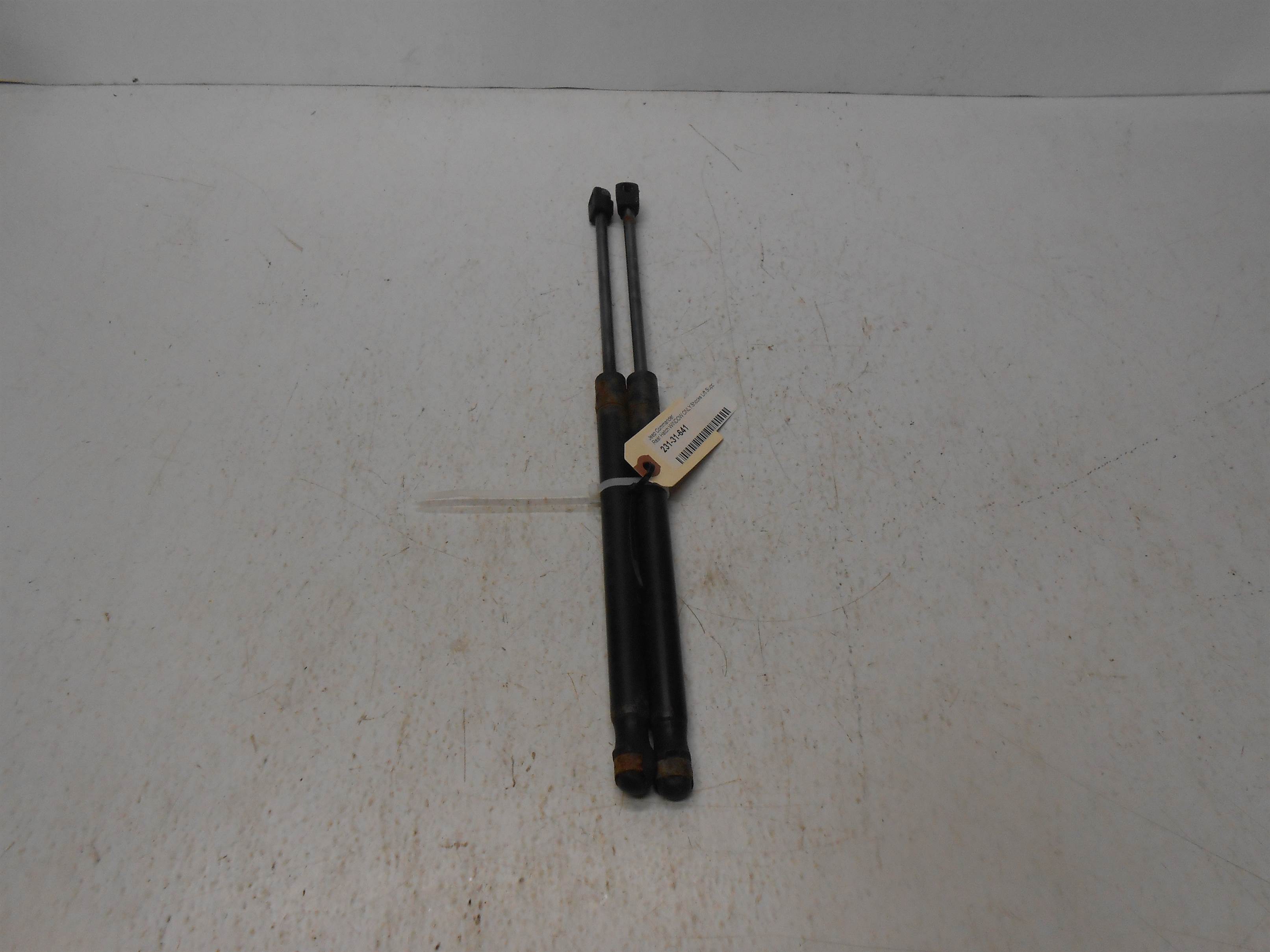 Used Back Glass Lift Support For Jeep Commander 06-10 for sale small view front thumbnail