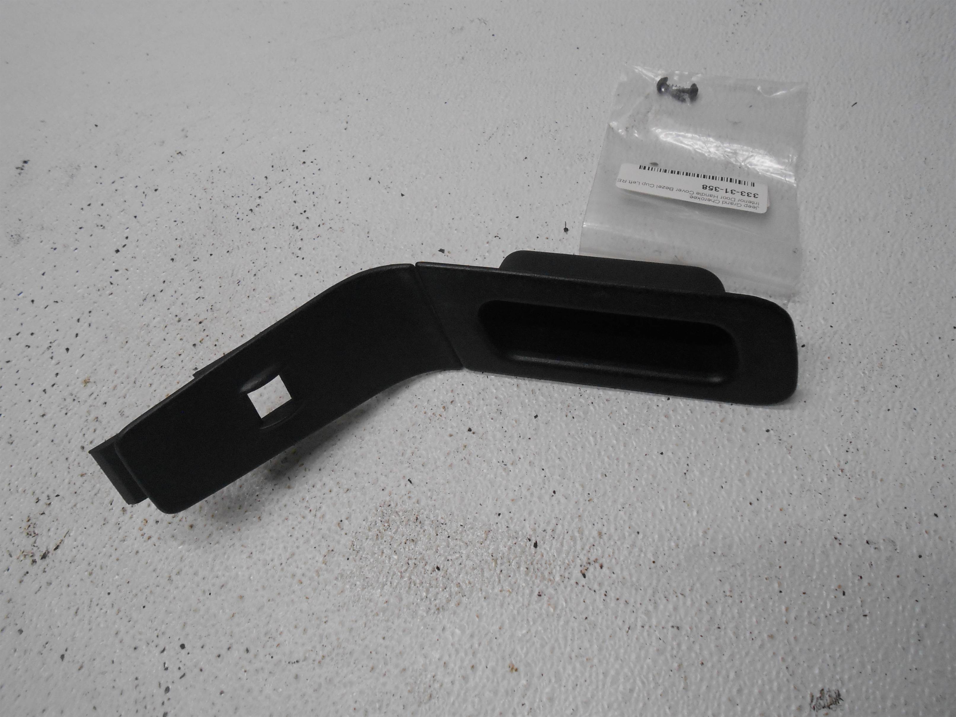 Used 2004 Jeep Grand Cherokee Rear Left Interior Door Handle Cover Bezel Cup for sale small view front thumbnail