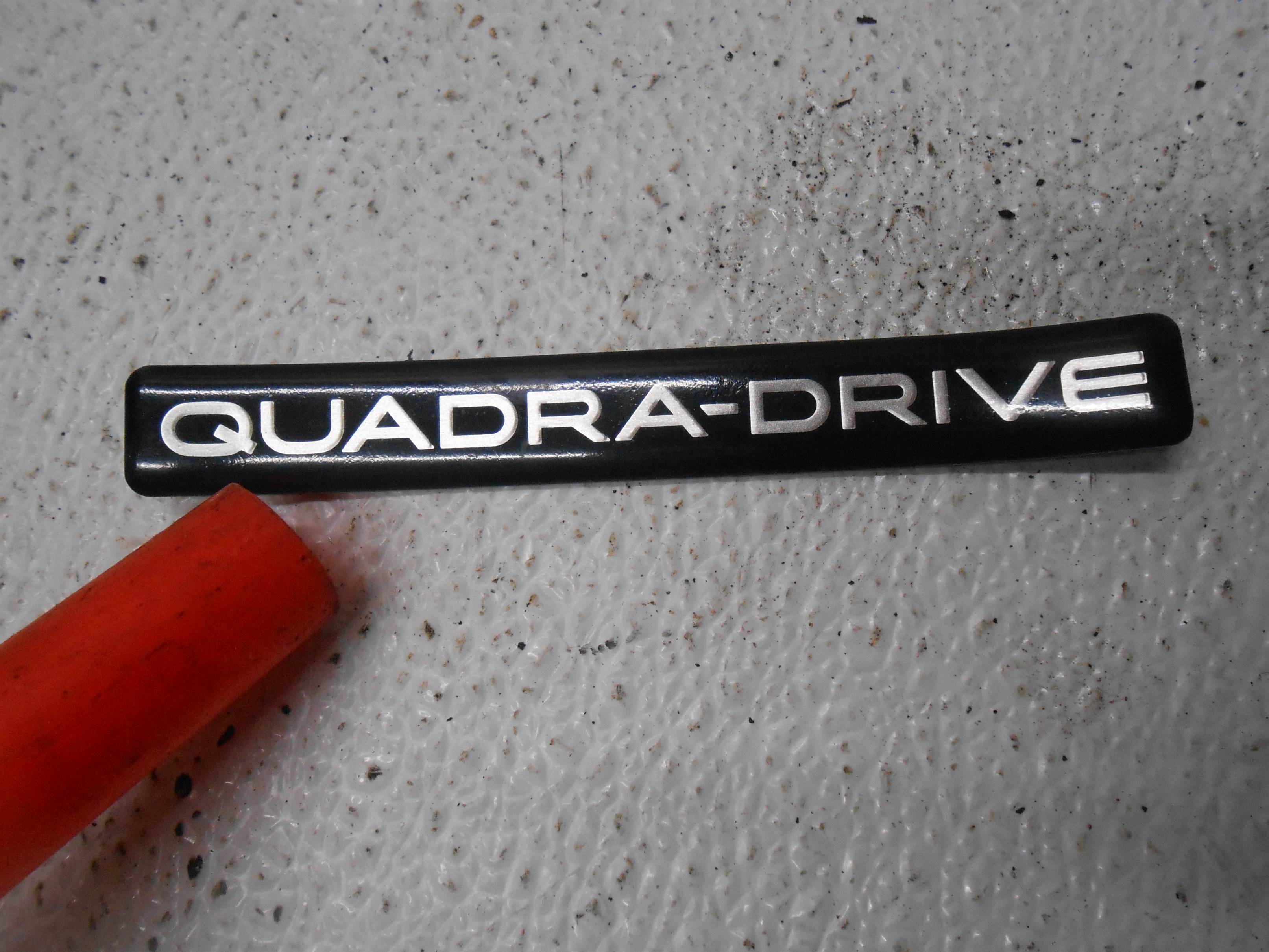 Used 2004 Jeep Grand Cherokee Exterioer Emlbem Quadra-Drive for sale small view front thumbnail