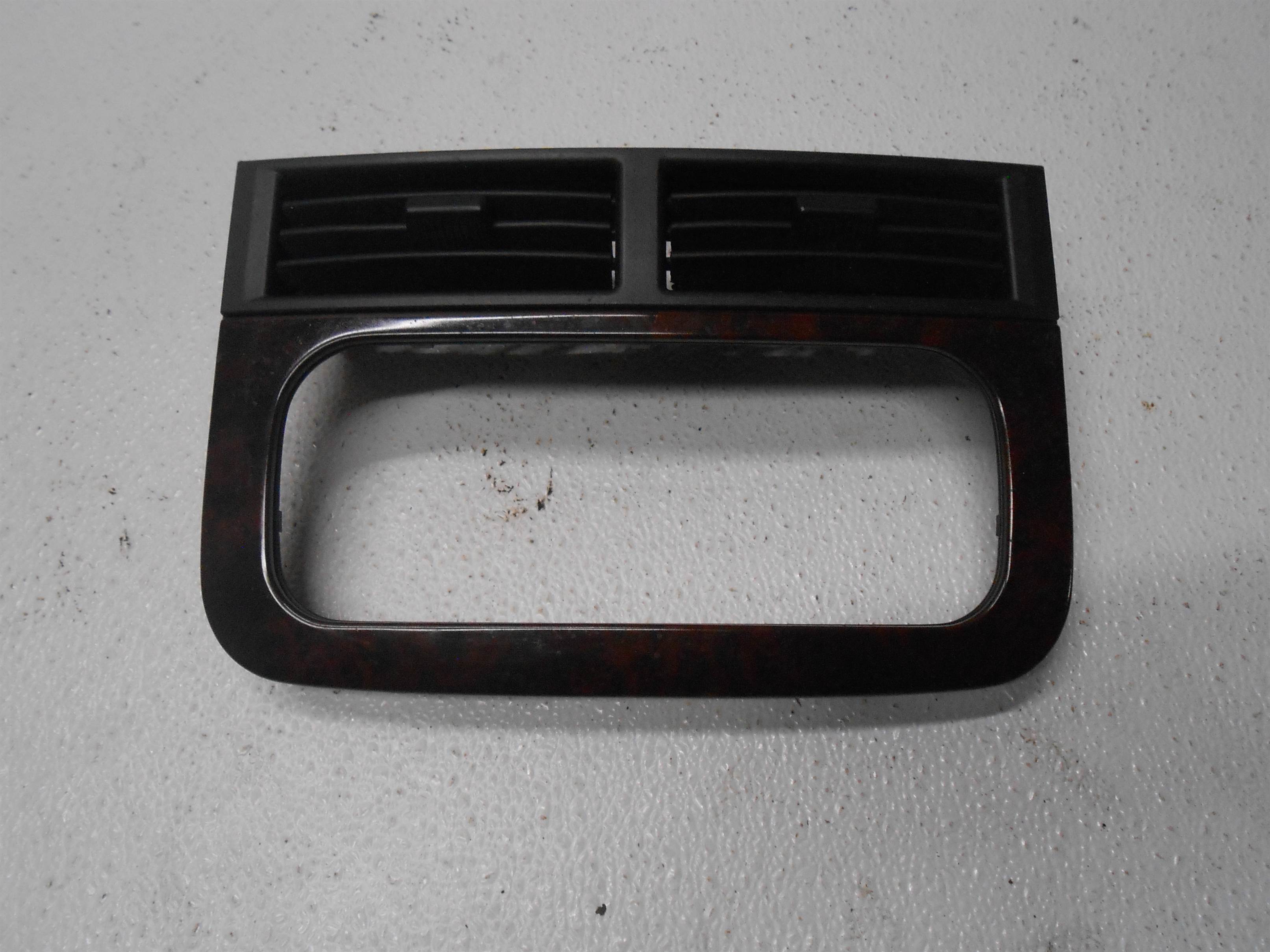 Used 2004 Jeep Grand Cherokee Dashboard Center Radio Bezel With Air Vent for sale small view front thumbnail