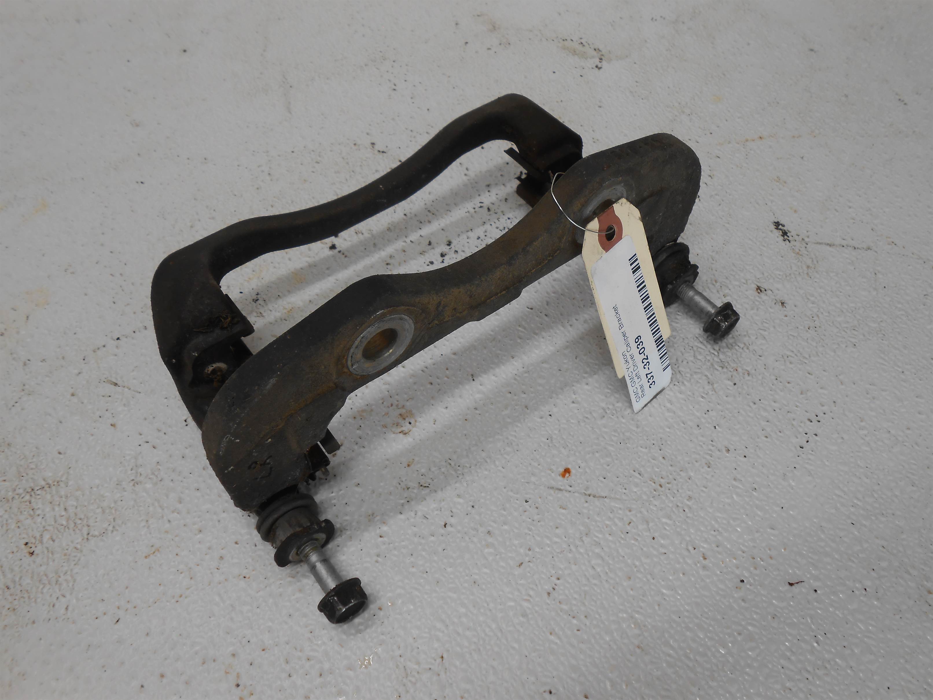 Used 2004 GMC Yukon Rear Left LH Driver side Brake Caliper Bracket for sale small view front thumbnail