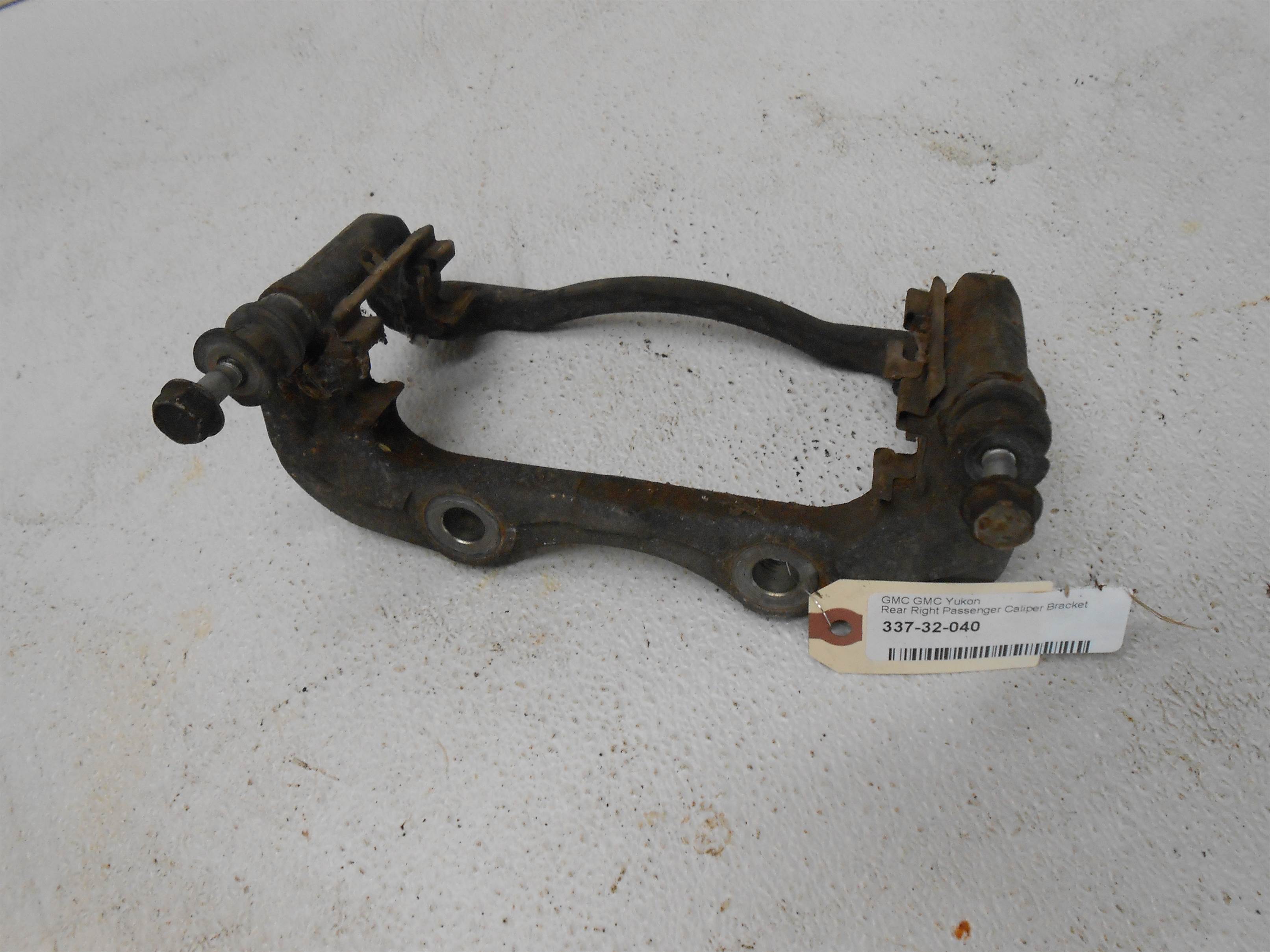 Used 2004 GMC Yukon Rear Right RH Passenger side Brake Caliper Bracket for sale small view front thumbnail