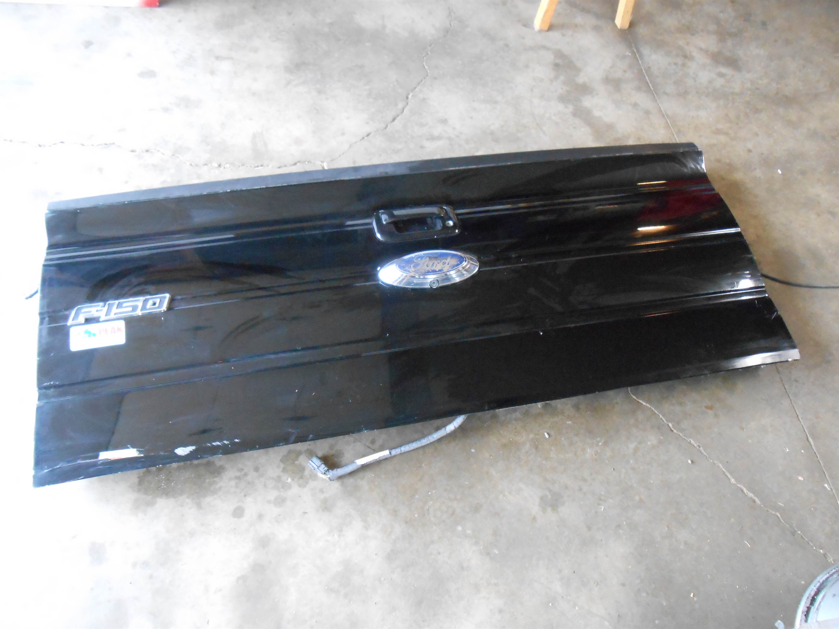 Used 2011 Ford F150 Tailgate Tail gate With Camera Black - Dent on one side for sale small view front thumbnail